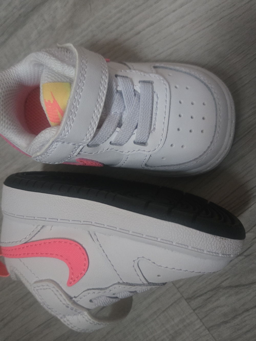 Nike Kids White Sneakers with Pink Swoosh